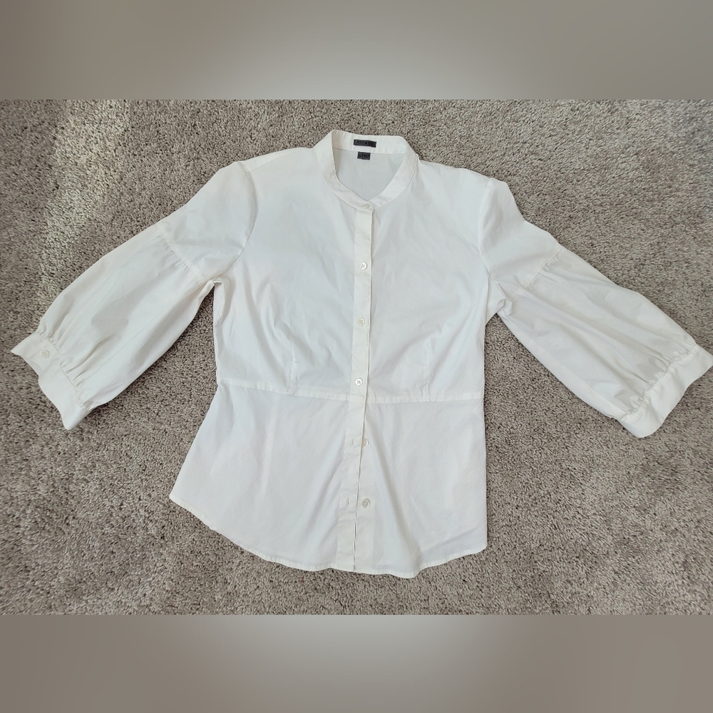 White Button-Up Blouse Premise.